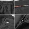 imageFREE SOLDIER Mens Outdoor Cargo Hiking Pants Water Repellent Softshell Fleece Lined Snow Ski Pants with Zipper Pockets Black 34W x 32L